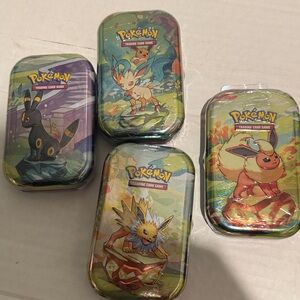 Pokémon TCG Prismatic Evolutions Mini Tins BNWt